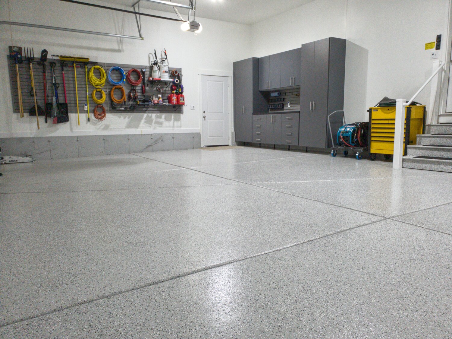 Garage epoxy and cabinets